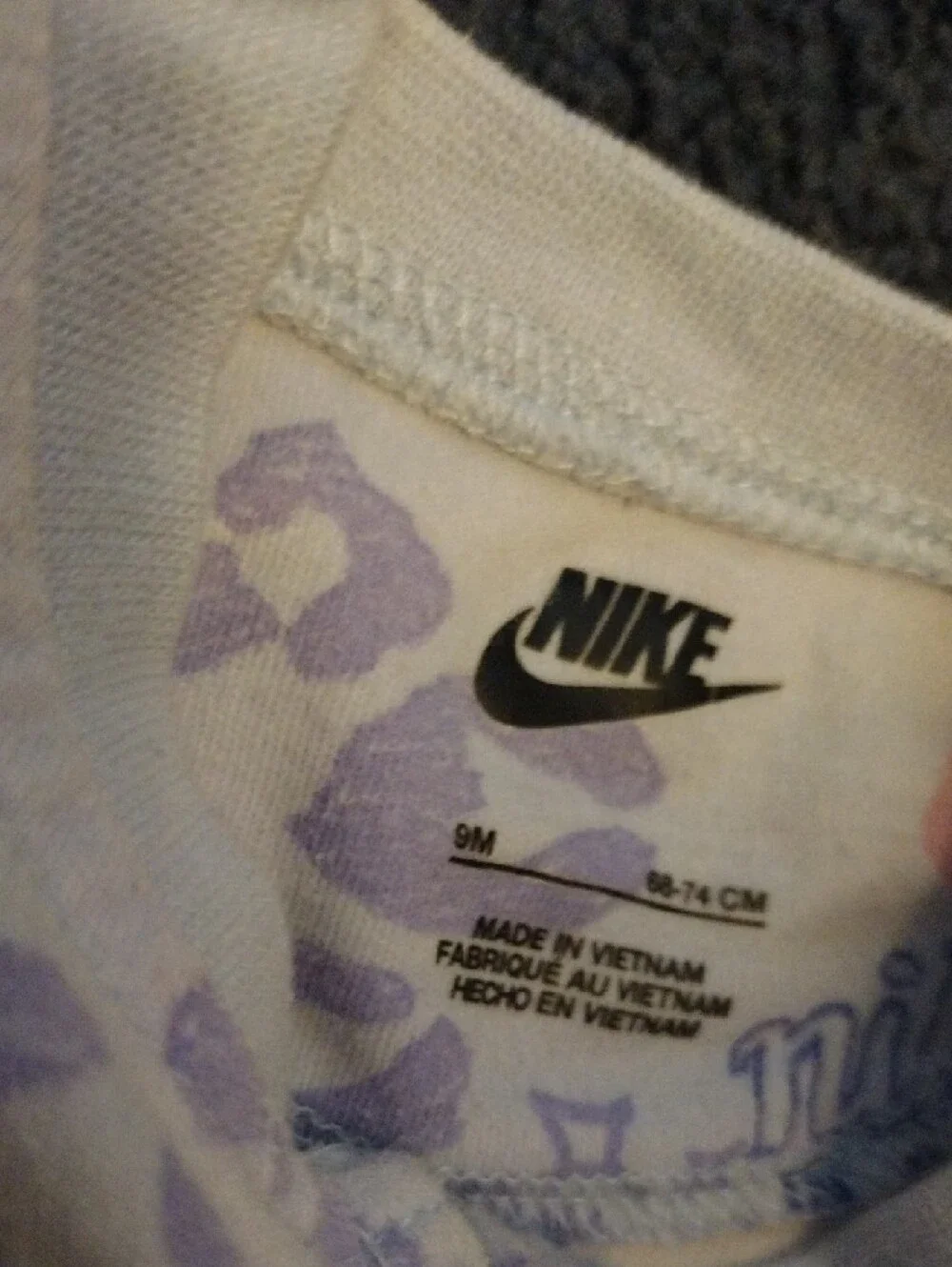 Nike Cream Footed One-Piece with Lavender and Peach Accents